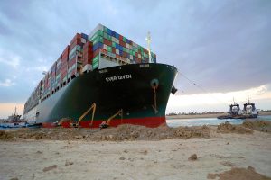 Suez Canal blocked as container ship runs aground