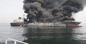Smoke rises from the 998-tonne fuel tanker Shoko Maru after it exploded off the coast of Himeji