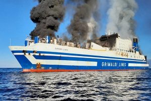 Smoke rises from the Italian-flagged Grimaldi Euroferry Olympia that caught fire off the coast of Corfu island