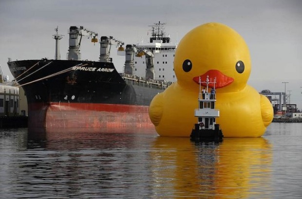 Giant inflatable rubber duck installation by Dutch artist Hofman floats through the Port of Los Angeles as part of the Tall Ships Festival, in San Pedro