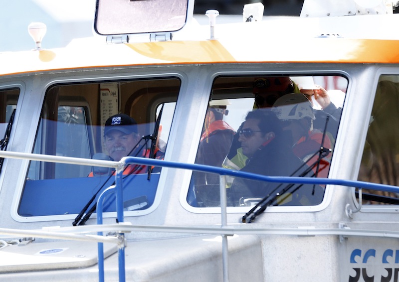 Captain Francesco Schettino takes a boat ride to get to the Costa Concordia cruise liner at the Giglio harbour