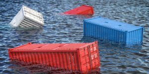 Shipping cargo container lost in the sea or ocean. Cargo isurance concept.